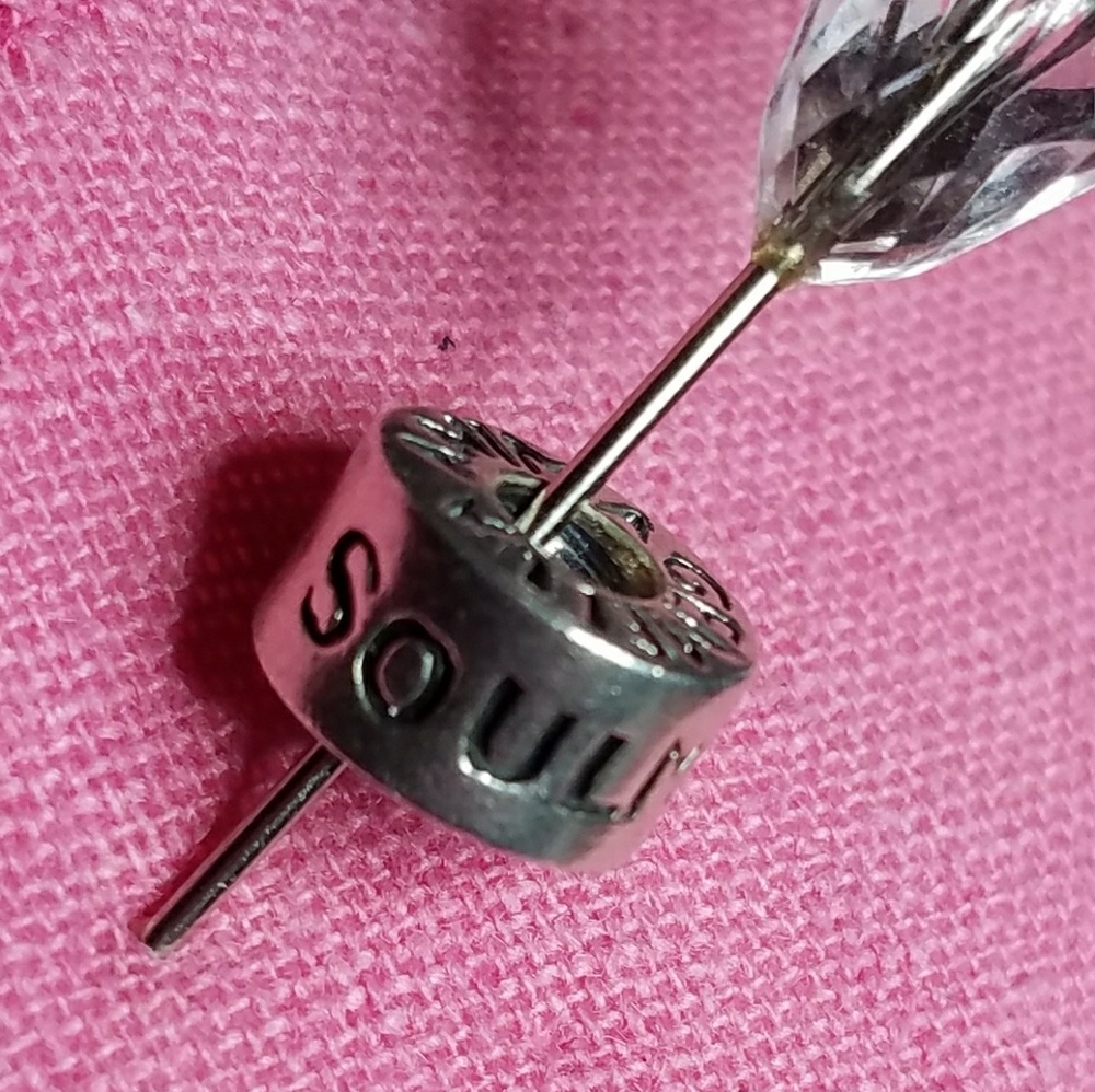 "Soulmate" sterling silver charm.